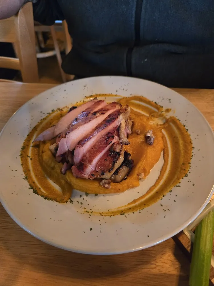 Smoked Pork Loin on Top of Pumpkin Sauce